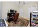 Home office with a desk, chair, and keyboard at 7820 Harbor Bridge, New Port Richey, FL 34654