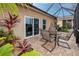 Outdoor patio with seating area and access to the house at 7820 Harbor Bridge, New Port Richey, FL 34654