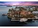 Luxury waterfront home with boat dock, pool, and stunning sunset views at 101 12Th E St, Tierra Verde, FL 33715