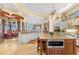 Spacious kitchen featuring island, granite countertops, and high-end appliances at 101 12Th E St, Tierra Verde, FL 33715