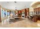 Open living area with fireplace, built-in shelving, and stunning water views at 101 12Th E St, Tierra Verde, FL 33715