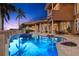Luxury waterfront home with a freeform pool and expansive patio at 101 12Th E St, Tierra Verde, FL 33715