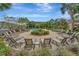 Relaxing pool area with ample lounge chairs and landscaping at 10316 Estero Bay Ln, Tampa, FL 33625