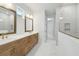 Elegant bathroom with double vanity and large shower at 28732 Rambutan Dr, Wesley Chapel, FL 33543