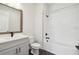 Clean bathroom with single vanity and bathtub at 28732 Rambutan Dr, Wesley Chapel, FL 33543