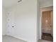 Light and airy bedroom with an ensuite bathroom at 28732 Rambutan Dr, Wesley Chapel, FL 33543