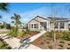 Charming single-story home featuring tidy landscaping, stone accents, and a serene neighborhood ambiance at 28732 Rambutan Dr, Wesley Chapel, FL 33543