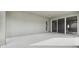 Covered patio with sliding glass doors at 28732 Rambutan Dr, Wesley Chapel, FL 33543