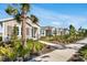 Scenic street view showcasing homes with well-manicured lawns and sidewalks for a walkable neighborhood at 28732 Rambutan Dr, Wesley Chapel, FL 33543
