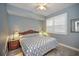 Spacious bedroom with king-size bed and updated flooring at 13313 Gasparilla Rd # 402, Placida, FL 33946