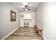 Home office with built-in shelving and hardwood floors at 13313 Gasparilla Rd # 402, Placida, FL 33946