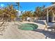 Community hot tub with lounge chairs nearby at 13313 Gasparilla Rd # 402, Placida, FL 33946