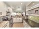 Modern kitchen with granite countertops and breakfast bar at 13313 Gasparilla Rd # 402, Placida, FL 33946