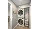 Stackable washer and dryer in a convenient laundry room at 13313 Gasparilla Rd # 402, Placida, FL 33946