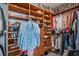 Well-organized walk-in closet with ample storage for shoes, clothing, and accessories at 208 Driftwood Ln, Largo, FL 33770