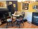Bright dining area with table, chairs, and access to kitchen at 2100 World Parkway Blvd # 14, Clearwater, FL 33763
