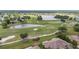 Aerial view of a luxury golf course community at 2226 Sifield Greens Way # 26, Sun City Center, FL 33573