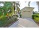 Property has a welcoming exterior with palm trees at 2226 Sifield Greens Way # 26, Sun City Center, FL 33573