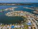 Wide aerial view showing home's location on a waterfront canal at 14035 E Parsley Dr, Madeira Beach, FL 33708