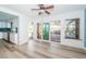 Bright dining room with sliding doors leading to patio at 14035 E Parsley Dr, Madeira Beach, FL 33708