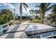 Wooden dock offering water access and canal views at 14035 E Parsley Dr, Madeira Beach, FL 33708