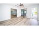 Bright living room with access to the backyard and kitchen at 14035 E Parsley Dr, Madeira Beach, FL 33708