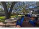 Backyard patio with table, chairs, and deck at 2227 Willowbrook Dr, Clearwater, FL 33764