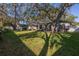 Large backyard with hot tub and spacious lawn at 2227 Willowbrook Dr, Clearwater, FL 33764