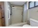 Clean bathroom with shower stall and grab bars at 2227 Willowbrook Dr, Clearwater, FL 33764