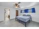 Bright bedroom with ensuite bathroom and a view at 2227 Willowbrook Dr, Clearwater, FL 33764