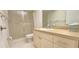 Clean bathroom with shower/tub combo and updated vanity at 3076 Eastland Blvd # 106, Clearwater, FL 33761