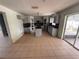 Kitchen with island and gray cabinets at 3336 Bellericay Ln, Land O Lakes, FL 34638