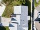 Aerial view of the house roof and surrounding area at 3499 Cedar Ln, Palm Harbor, FL 34684