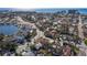 Aerial view of a house near the beach and waterways at 7060 Boca Ciega Dr, St Pete Beach, FL 33706