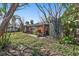 Brick home's exterior with a walkway and landscaping at 7060 Boca Ciega Dr, St Pete Beach, FL 33706