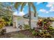 Private backyard with patio and lush landscaping at 790 7Th Ne Ave, Largo, FL 33770