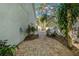 Brick paved backyard patio area with lush landscaping at 790 7Th Ne Ave, Largo, FL 33770