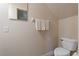 Small bathroom with toilet and sink at 790 7Th Ne Ave, Largo, FL 33770