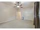 Well-lit bedroom with ceiling fan and double doors at 790 7Th Ne Ave, Largo, FL 33770