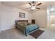 King-size bedroom with ceiling fan and access to the backyard at 790 7Th Ne Ave, Largo, FL 33770