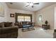 Bright living room with brown sofas and a coffee table at 790 7Th Ne Ave, Largo, FL 33770