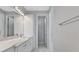 Bathroom with single vanity and access to other rooms at 7214 Blossom Ave, Tampa, FL 33614