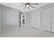 Bright bedroom with large closet and access to bathroom at 7214 N Blossom Ave, Tampa, FL 33614