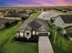 Aerial view of a single-Gathering home with a lake view in a quiet community at 11101 58Th Street E Cir, Parrish, FL 34219