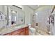 Second bathroom with granite vanity and shower at 11101 58Th Street E Cir, Parrish, FL 34219