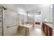 Bathroom features a walk-in shower and soaking tub at 11101 58Th Street E Cir, Parrish, FL 34219