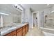 Elegant bathroom with granite countertops and walk-in shower at 11101 58Th Street E Cir, Parrish, FL 34219