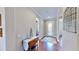 Bright and spacious entryway with hardwood floors and decorative accents at 11101 58Th Street E Cir, Parrish, FL 34219