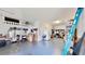 Large garage with overhead storage and shelving at 11101 58Th Street E Cir, Parrish, FL 34219