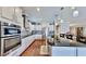 Modern kitchen with stainless steel appliances and granite countertops at 11101 58Th Street E Cir, Parrish, FL 34219